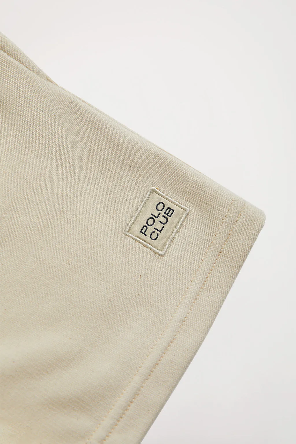 Pantalón corto orgánico beige Neutrals kids con logo